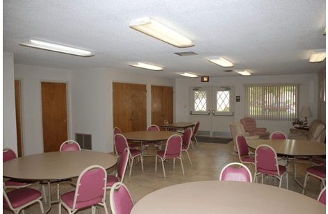 Community room with tables and chairs