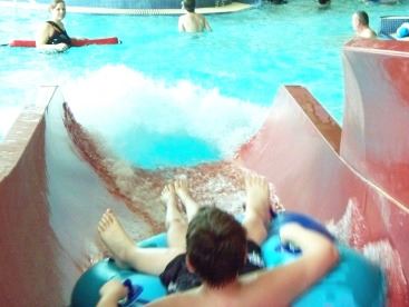 Boy Riding Water Slide