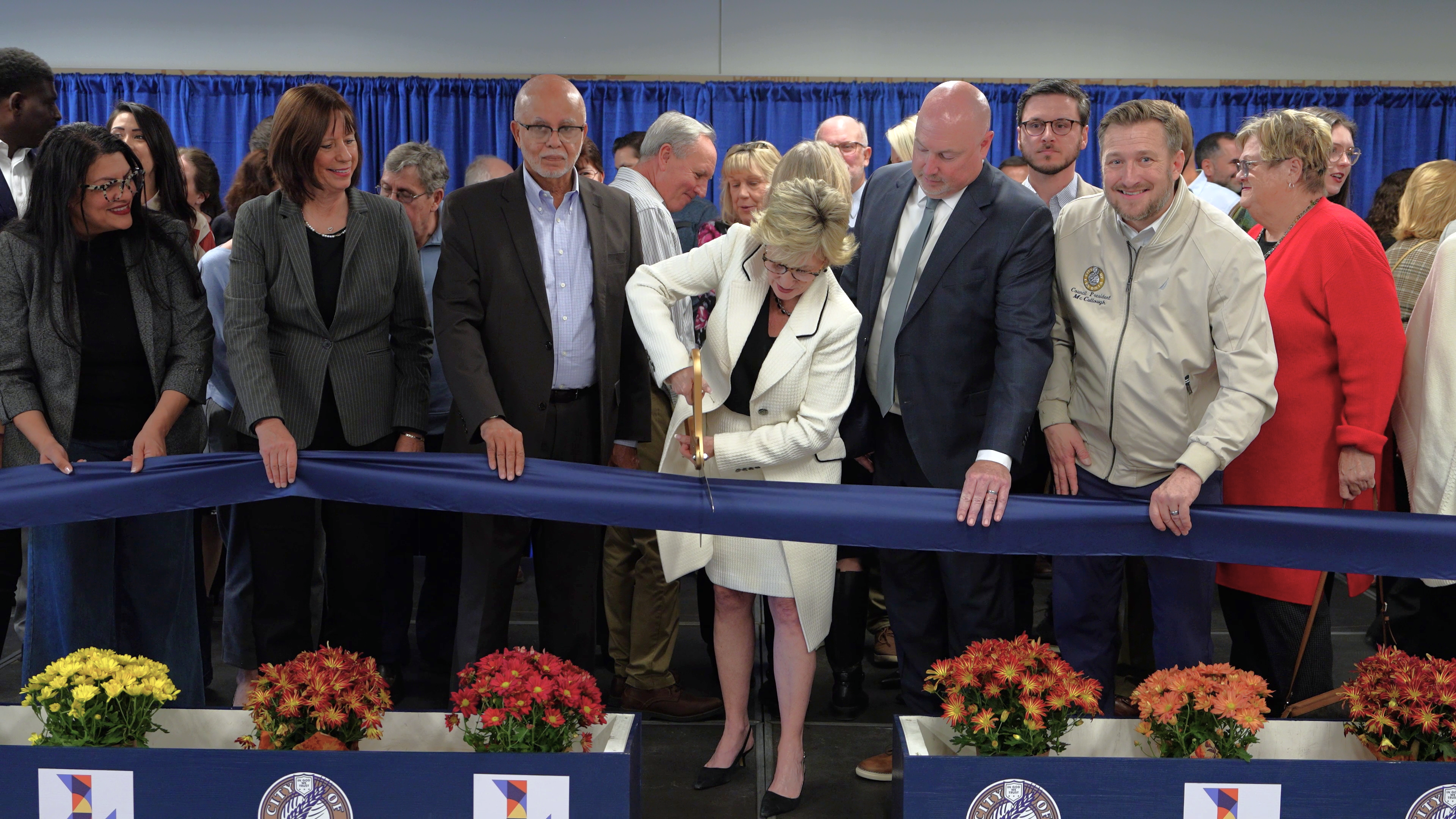 2025-11-13 LSWC Ribbon Getting Cut